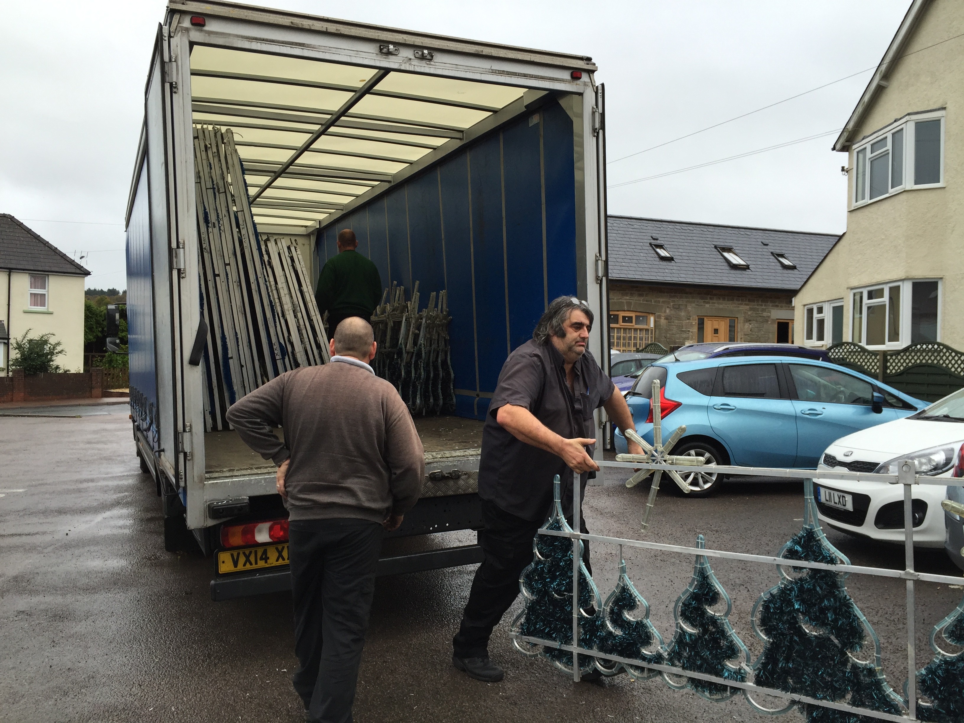 Christmas lights being unloaded from a lorry