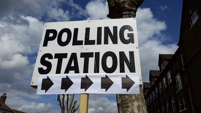 Sign post to a polling station